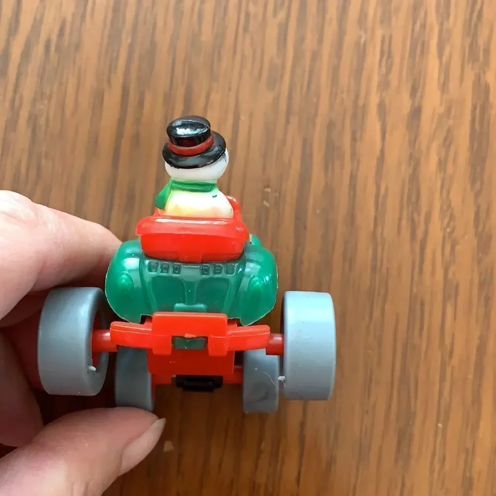 2 plastic wind up Christmas snowmen‎
